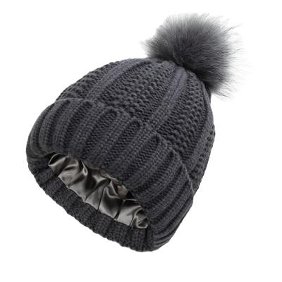 China Daily Lifestyle Warm Knitted Women Hat Striped Winter Hats For Women Lace Fur Pompom Wool Beanies Thick Skullies Hat Y0068 for sale