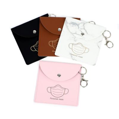 China Portable Reusable Fashion Key Chain Bag Pendant Dust Bag Storage Daily Life Mask Key Chain Leather Accessories Y0185 for sale