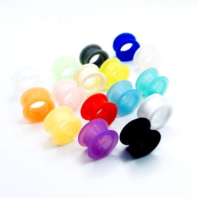 China Popular punk double flared earrings silicone ear piercing plug flexible rubber tunnel thick body jewelry for sale