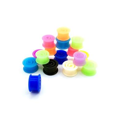 China Spiral Flexible Rubber Body Tunnel Jewelry Silicone Ear Piercing Punk Cut Out Plug for sale