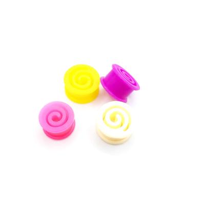 China Spiral Flexible Rubber Body Tunnel Jewelry Silicone Ear Piercing Punk Cut Out Plug for sale