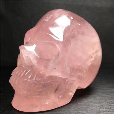 China Wholesale Top Selling Hand Carved Sculpture Rose Quartz Skulls For Decoration from China for sale