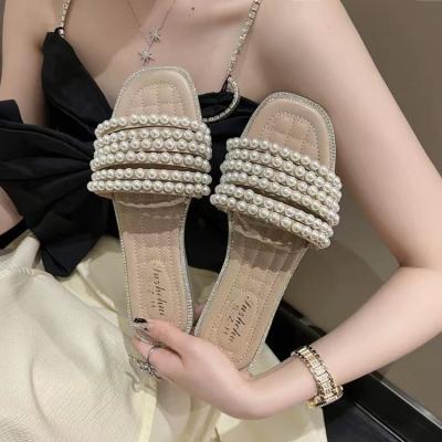 China Designer Retro Style Ladies Fashion Trend Niche New With Jelly Sole French Girls Fashion Flat Outlet Pearl Slippers Casual Slippers for sale