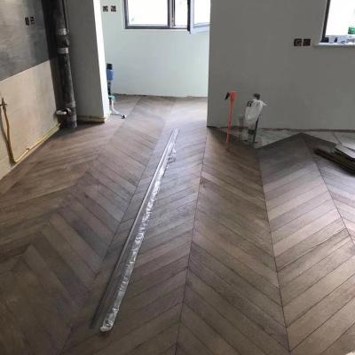 China Modern Gery wire brushed distressed multi/3 layers fishbone oak wooden flooring for sale