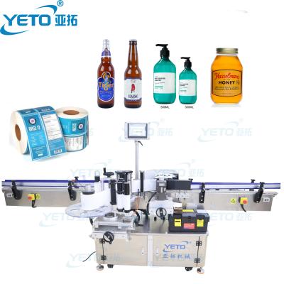 China Food Speed ​​YETO High Speed ​​Wine Juice Glass Plastic Round Bottle Labeling Machine Automatic Beer Bottle Labeling Printer for sale