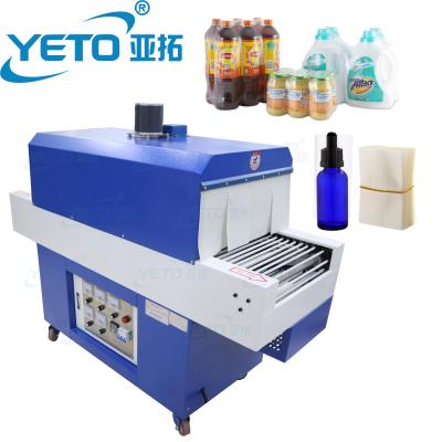 China YETO-Cosmetic Bottle Jar Shrink Electric Pet Food Film Machine Automatic Plastic Bottle Heat PVC Sleeve Tunnel Wrapping Packing Machi for sale