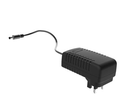 China UniversalÂ   cctv power supply 12v 2a 24w transformer wall mount ac dc power adapter with UK plug dc 5.5*2.5mm for sale