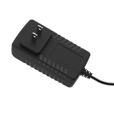 China UniversalÂ   Manufacturer High Quality 9v2a Wall AC Adapter Power Supply US Plug For LED Display Modem for sale