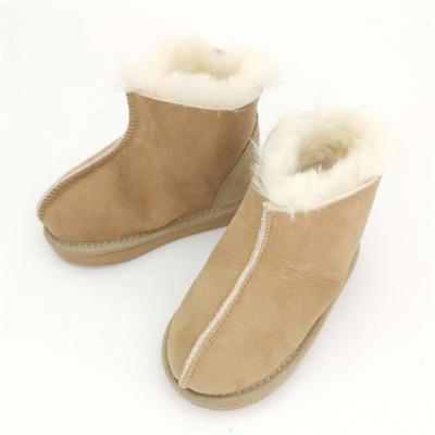 China HQS-KS001 Anti-Smell OEM Customized Genuine Sheepskin Moccasin Slippers Sheepskin Slippers For Kids. for sale