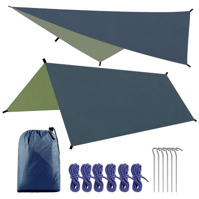 China Diamond Ground Nail Waterproof Outdoor Hexagonal Camouflage Awning Sunscreen Beach Tent Multifunctional Camp Tarp for sale