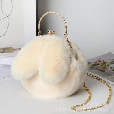 China Autumn Winter New Rabbit Ear Plush Bag Female Oblique Cross Korean Version Portable Clip Mouth Bag Fashion Handsome Plush Bag for sale