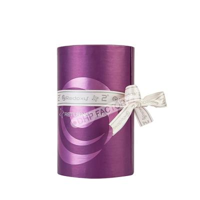 China Recyclable Luxury Custom Round Open Door Ribbon Essential Oil Knot Cosmetic Paper Box Packaging With Eva Insert for sale