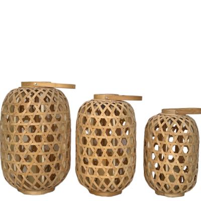 China Home Decoration Handmade bamboo  Rattan with LED candle  Natural Lantern with Handle for Wedding and Home Decorations for sale