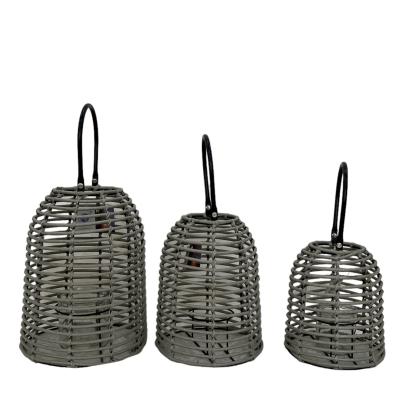 China Home Decoration Poly Rattan Handmade Lanterns Outdoor Candle Lantern With Glass Inside for sale