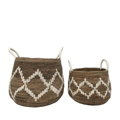 China Sustainable Handmade Baskets Wicker Storage Laundry Basket With Banana Leaf Material for sale