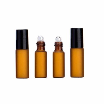 China Amber Perfume Cosmetic Bottle Empty Glass Personal Care Packaging Essential Oil Roll On Bottle With Trackball for sale