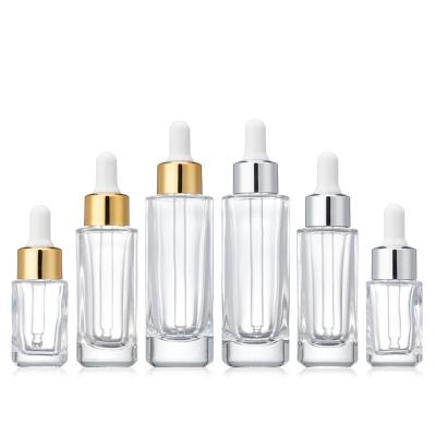 China Wholesale Empty Transparent Square Cosmetic Dropper Bottle Essential Oil Bottle for sale