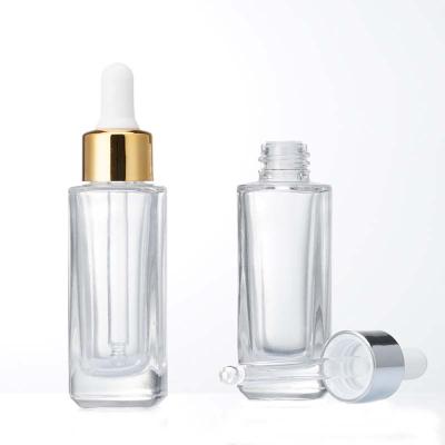 China Transparent Portable Cosmetic Bottle Essential Oil Bottle Cosmetics Empty Square Dropper Bottle for sale