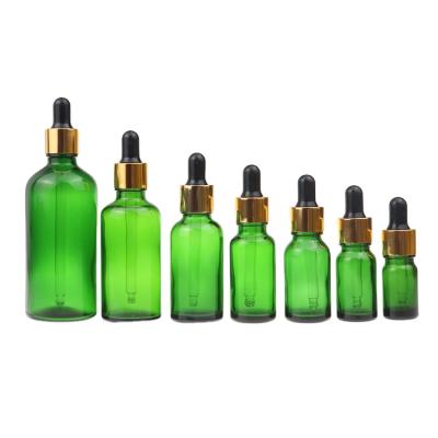 China Personal Care 10ml Frosted Green Glass Dropper Bottle Essential Oil Bottle CBD Oil Dropper Bottle for sale