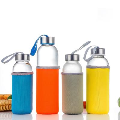 China Stocked wholesale 300ml Custom Glass Water Bottle 500ml 750ml water glass bottle with lid for sale