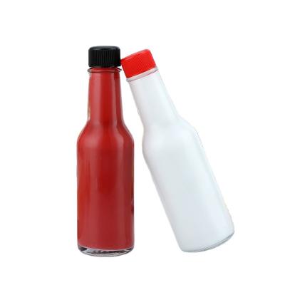 China Food High quality transparent glass bottle with black spiral plastic cap chill sauce ketchup glass bottle for kitchen for sale