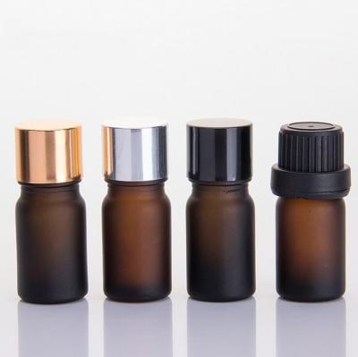 China Essential Oi factory stock 5ml frosted amber glass bottle with dropping cap brown color glass essential oil bottles for sale