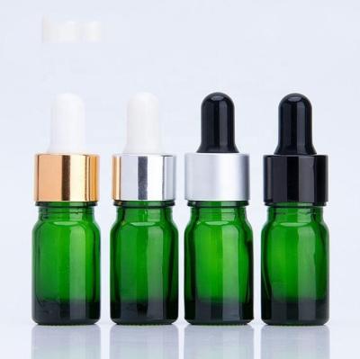 China Essential Oi China manufacturer stock 5ml 10ml 20ml green color essential oil glass bottles glass dropper bottle for sale