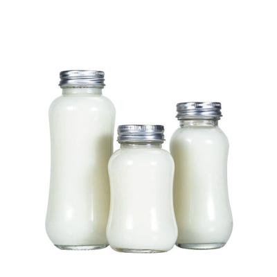 China 200ml Glass Clear Empty Beverage Milk Bottle Fruit Drink Beverage Juice Bottle With Aluminum Lid for sale