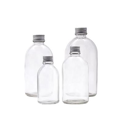 China Custom Logo Wholesale Round Clear Juice Glass Beverage Water Bottle for sale