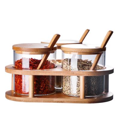 China Viable Hot Selling Glass Spice Jar Set With For Decorating Kitchen Spice Glass Jars Wooden Lid And Wooden Spoon for sale