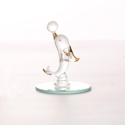 China animal glass dolphin with mirror base for sale