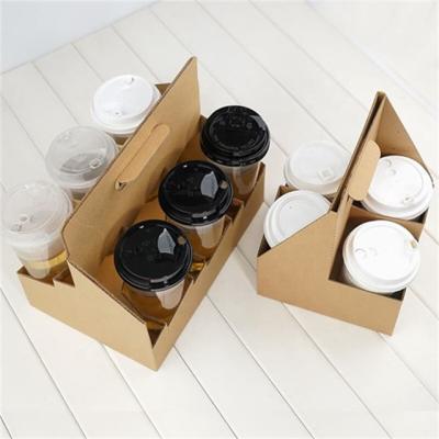 China Disposable Disposable Cup Holder For 4 Cups Hot Or Cold Drinks 2cups Drink Carrier With Handle Kraft Cardboard Coffee Cup Holder for sale