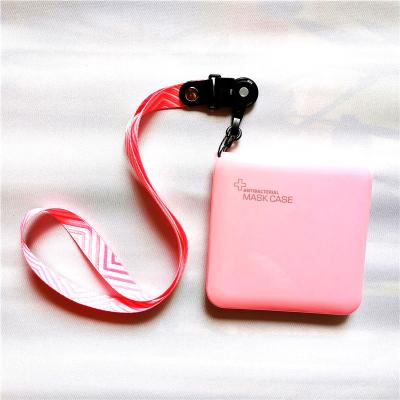 China Recyclable Glossy Plastic Anti Bacterial Mask Case With Neck Lanyard for sale