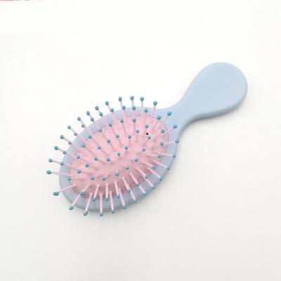 China Salon Pastel Colors Mini Small Round Plastic Detangle Detangling Hair Brush Paint Detangler Brush For Kids for sale