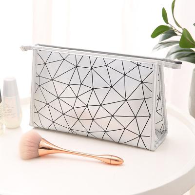 China Fashion Geometric PU Leather Cosmetic Pouch Makeup Bag Travel Zipper Organizer for sale