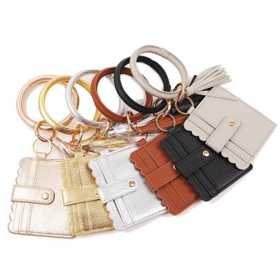 China China Multifunctional Round Leather Main Card Holder PU Leather Round Key Chain With Matching Wristband Wallet for sale