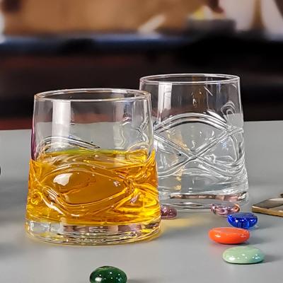 China Vidrio hecho a mano del whisky del diseño integrado del arco en venta