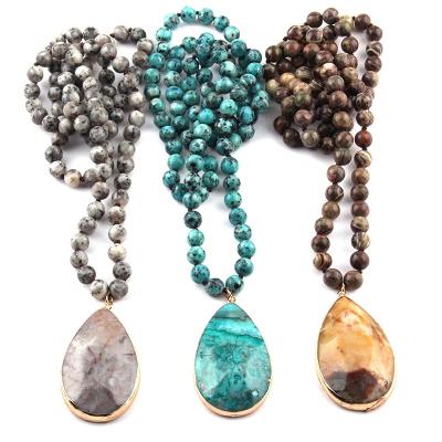 China Environmental Friendly Natural Stone Knot Necklace Women Long Stone Drop Pendant Necklaces en venta