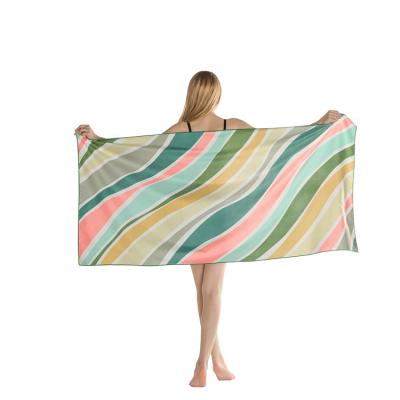 China New color QUICK DRY stripe printing beach towel fleece double-sided quick-drying absorbent portable bath towel for sale