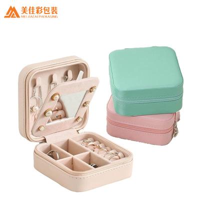 China Eco-friendly Luxury Travel Jewelry Organizer PU Leather Box Book Jewelry Storage for sale