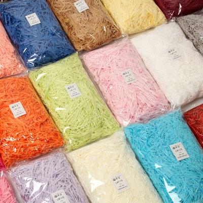 China Christmas 100g Waterproof Wholesale Decorative Cut Tissue Shred Wrapping Shredded Paper Filler for sale