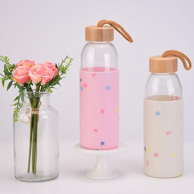 China Leakproof 17oz Bamboo Lid Bottle Silicone Sleeve Glass Drinking Anti-scalding Protective Water Bottle Stored for sale