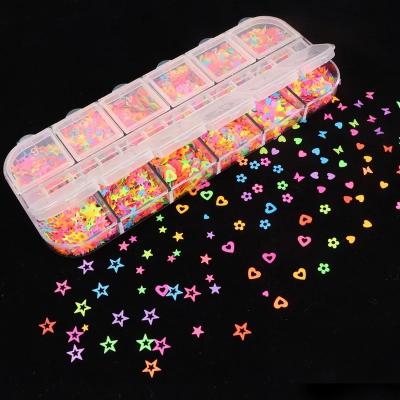 China New PET Fashion Nail Jewelry 12 Colors Butterfly Sequins 3MM Fluorescent Nail Sequins Star Heart Nail Patch for sale