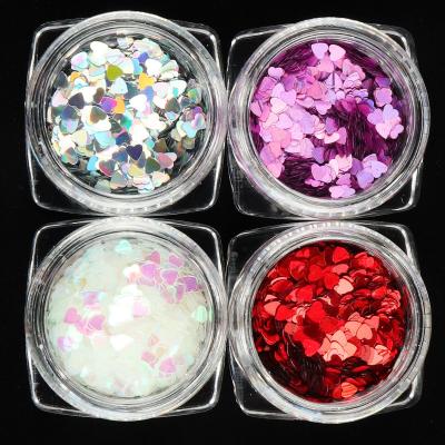 China Popular 3G Bottled Nail Jewelry Laser Heart Nail Sequins Shapes Women Nail Patch for sale