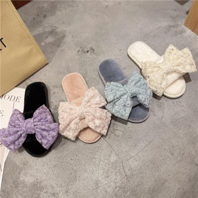 China Fashion Trend Women Fur Slides Sandals Elegant Bowknot Winter Room Bedroom Slippers For Guests Ladies for sale