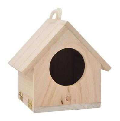 China Retro Breathable Arts And Crafts Large Nest Aviary With Rope Paulownia Wood Bird Feeders for sale