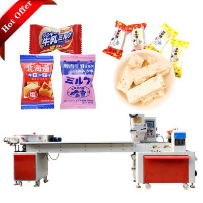 China Multi Function Horizontal Flow Food Package Hard Candy Packing Machine for sale