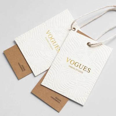 China Free Design Viable Factory Direct Sales Customized Apparel Textured Seed Logo Label Hang Tags For Apparel à venda