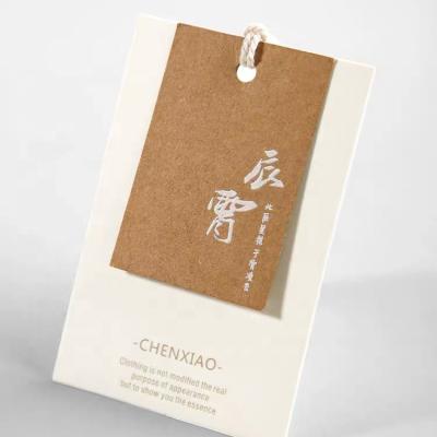 Cina Viable High Quality New Design Clothes Hang Tag Garment Hair Hang Tag Hair Paper Hang Tag in vendita