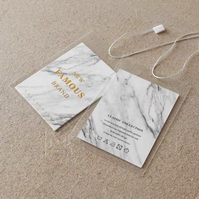 Cina Good Quality Sustainable Custom Plastic Paper Tags Garment Hangtags For Clothing Own Logo Hair Hangtag in vendita